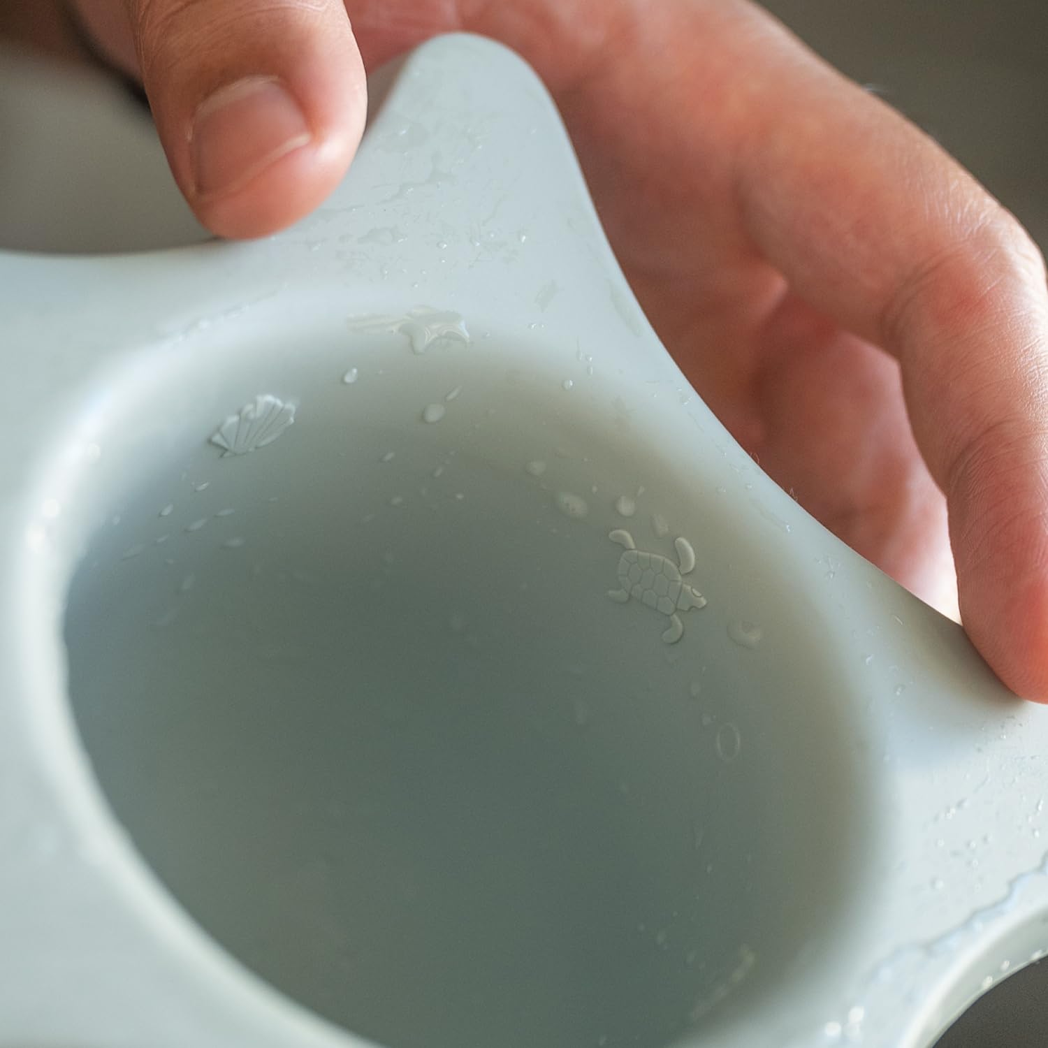 kindsgut-duschhilfe-silikon-seestern-aquamarin image 4